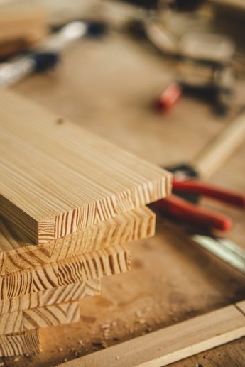 professional carpentry tool, equipment for workshop with wood industry, carpenter working in woodwork craft construction, craftsman and wooden plank in carpenter's shop